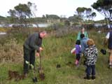 Peter Weissing – NRC Manager digging holes for the kids to plant their trees at 2009 Arbor Day
